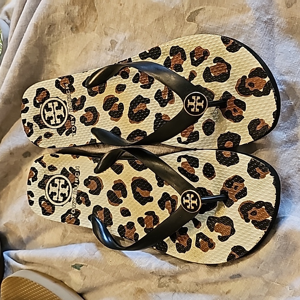 Tory Burch leopard flip flops.